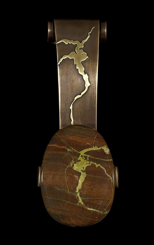 Metal and rock door knocker