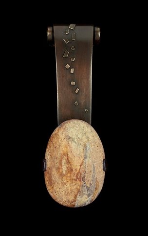 Metal and feldspar with quartz door knocker